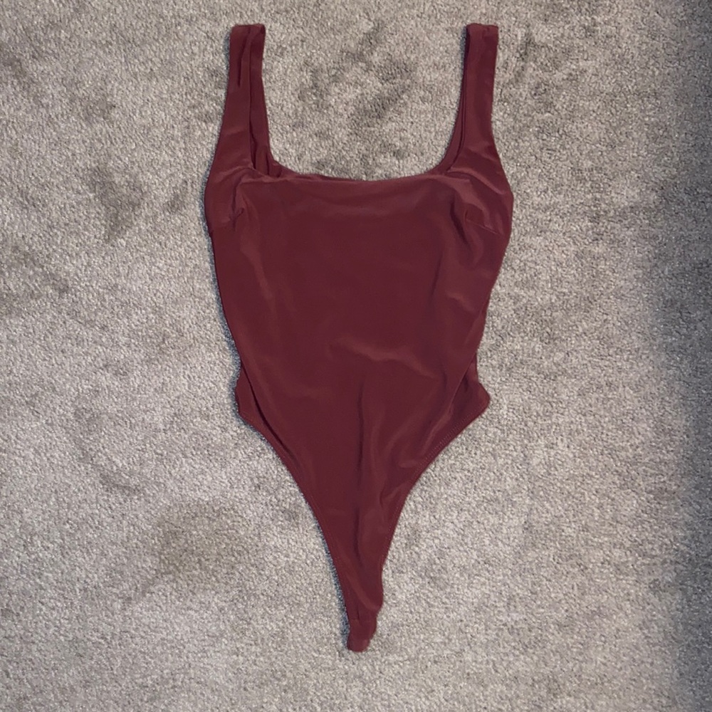 DAY & NIGHT SIZE SMALL PURPLE BODY SUIT